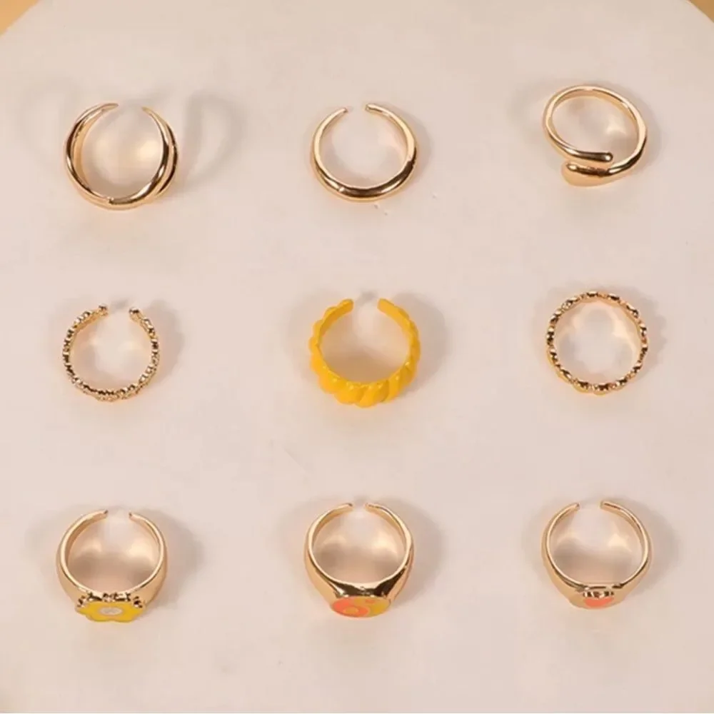 SET OF 9 RESIZABLE RINGS IN‎ YELLOWS AND ORANGE